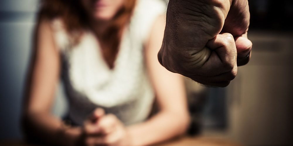 Woman in fear of domestic abuse Domestic Violence Compensation